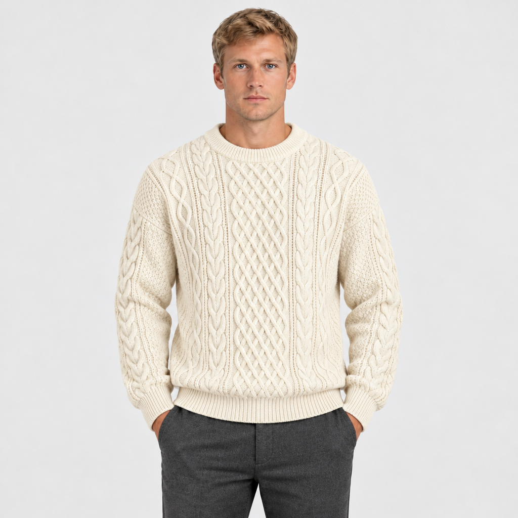 Men's white cable knit crew neck jumper — front view, model with hands in trouser pockets